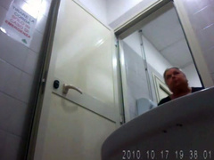 Fat granny urinating and wiping in hidden cam clip