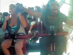 Amateur tits pop out during a roller coaster ride