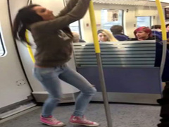 Playful college chick pisses on the subway platform