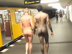 Gay exhibitionists walk naked down street