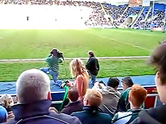 Female fan goes streaking at a football match