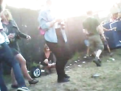 Lots of public pissing at a music festival