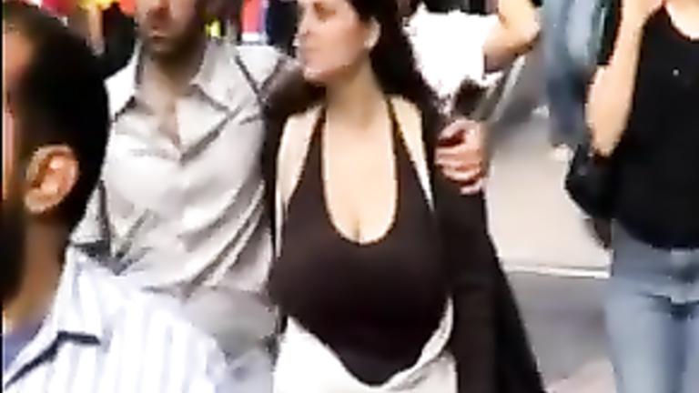Braless girlfriend walking down the street and being filmed