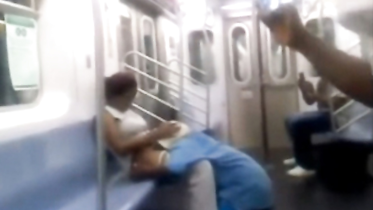 Dude eats out sexy black pussy on the train