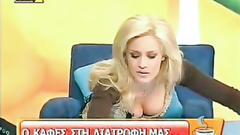 Big tits downblouse of blonde TV host