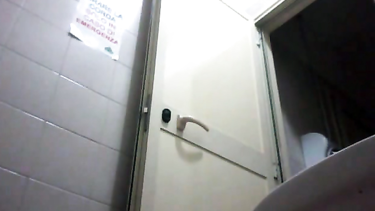 Cute curvy blonde pees in spycam flick