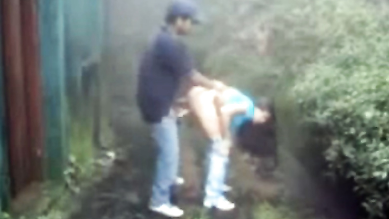 Couple fucks outdoors on a stormy day