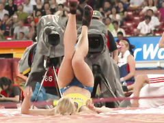 Sexy sportswoman with a big butt does pole vaulting