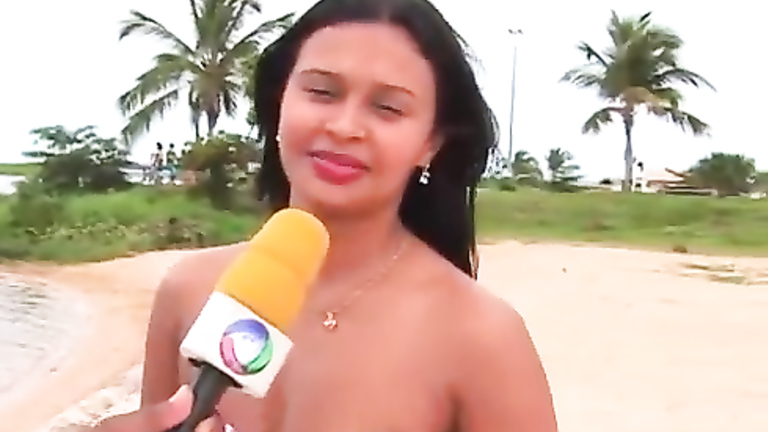 Smoking hot Brazilian sex bomb poses on the sandbeach