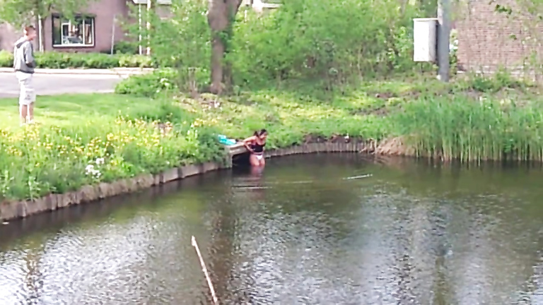 Chubby Brazilian chick takes a quick swim in the local river