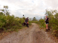 Ladies taking a pee on a quadbike adventure