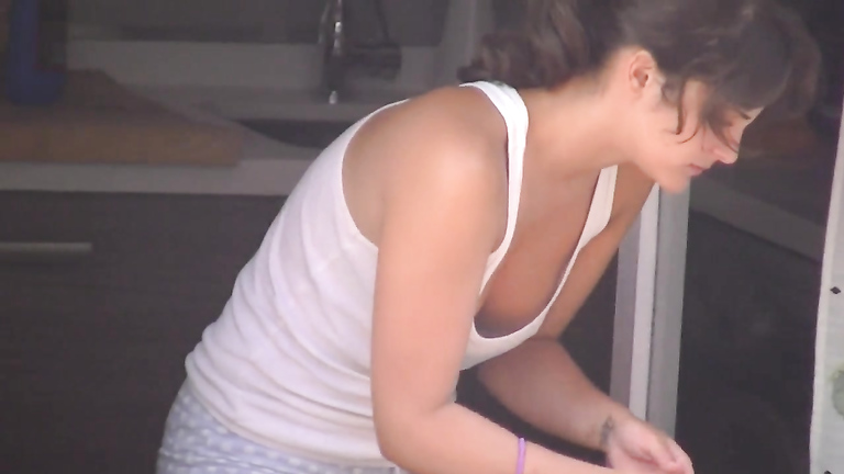 My smoking hot neighbor shows off her cleavage while cleaning