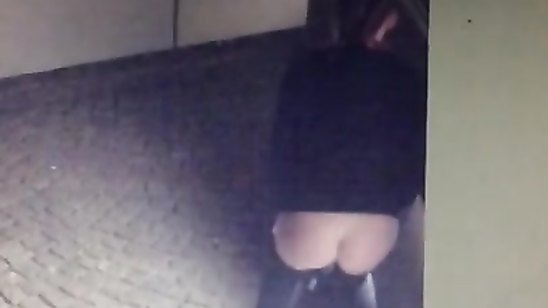 Good looking maid pees while her friend stands on guard