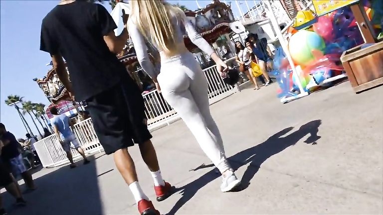 Lovely teen walks around in really tight pants