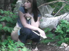 Desperate brunette gets recorded relieving herself in the woods