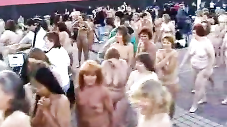 Hundreds of people strip nude to pose for a picture