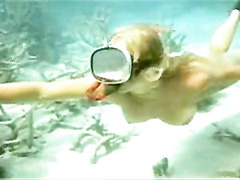 Naked Helen Mirren snorkeling in the ocean