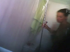 Tattooed chick gets clean in the shower