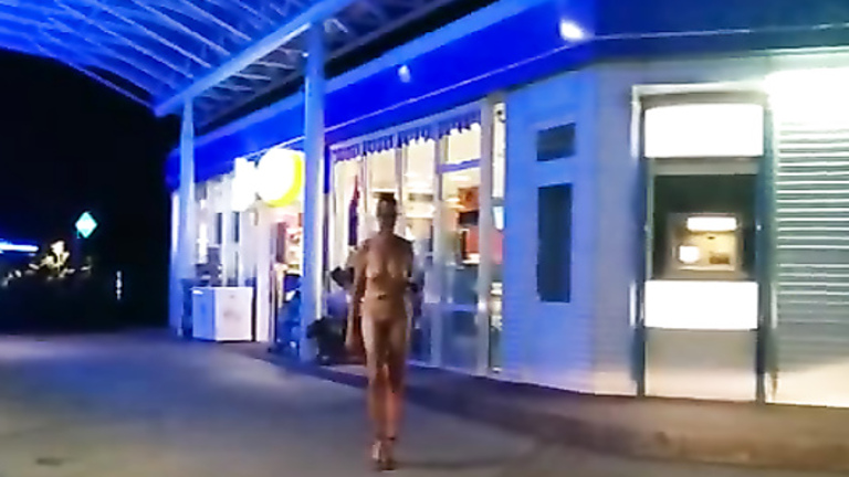 Naked slave in a collar shops at a convenience store