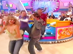 Tits pop out dancing on a TV show