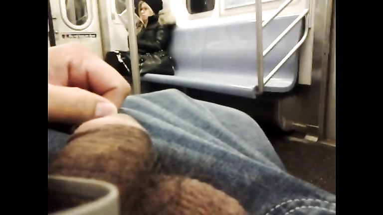 Stroking cock to the hot blonde on the subway