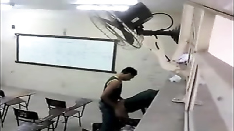 Doggystyle quickie in a lecture hall caught on camera