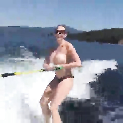 Topless chick in the water skiing adventure