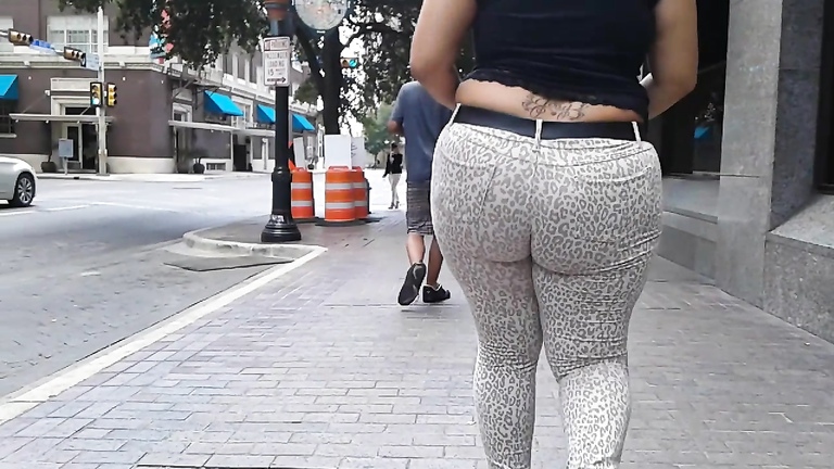 Plump bottom going through the streets