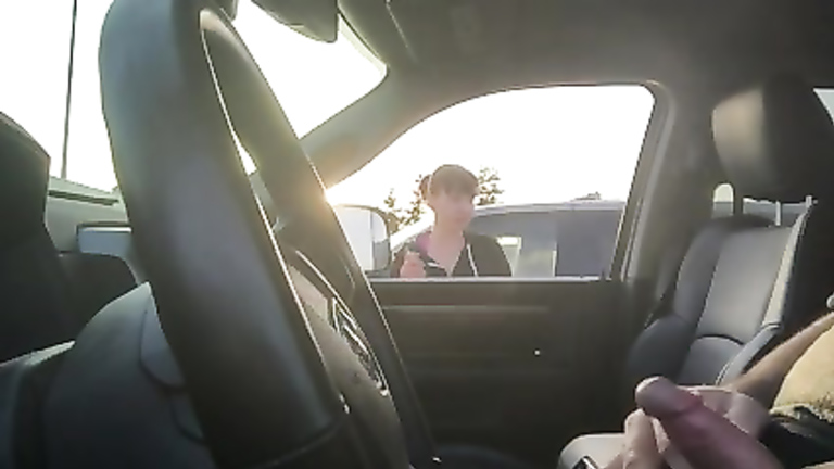 Smoking woman watches him jerk off in the car