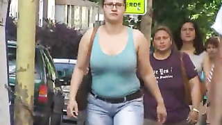 Big bouncy boobs on a British woman walking the street