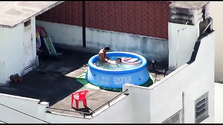 Doggystyle screwing outdoors in the pool