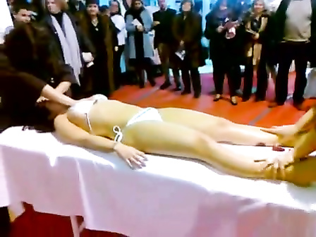 Double massage in public of an Asian bikini girl